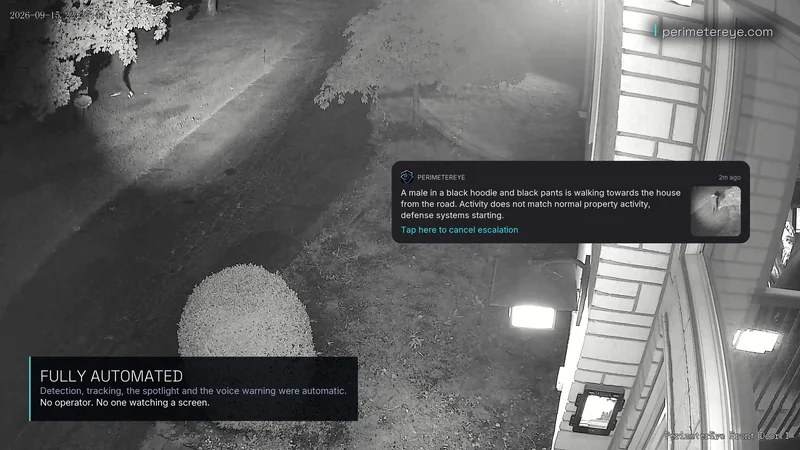 The searchlight following the person to the edge of the lawn